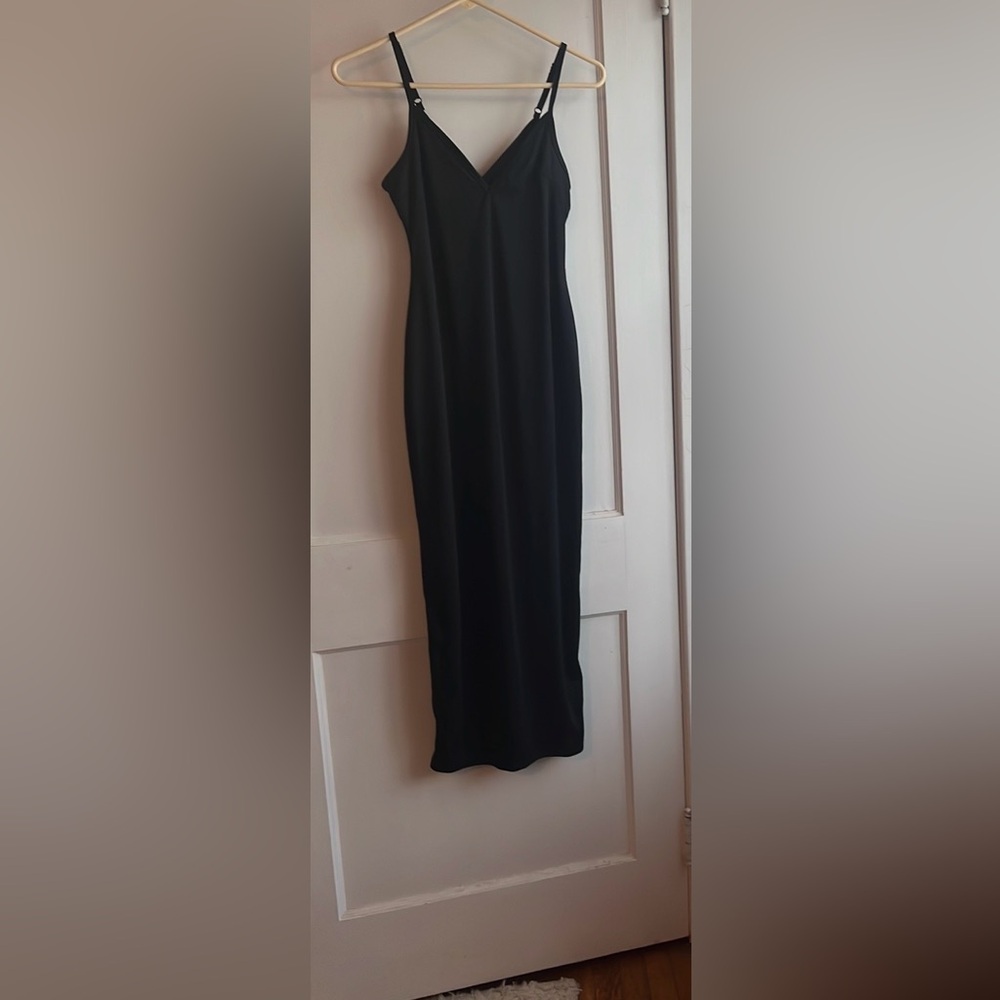 No brand, no tags black polyester slip dress with adjustable straps.
